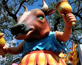 Rex float portraying a cow ringing bells. New Orleans