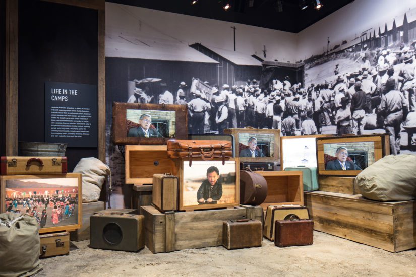 Photo from United but Unequal: I am an American exhibit. Display depicts suitcases carried by Japanese Americans carried to internment camps. Photo courtesy of National WWII Museum.