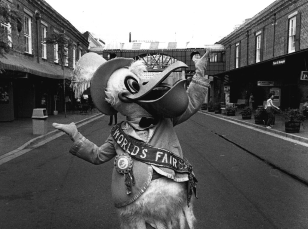The 1984 World’s Fair mascot, Seymour D. Fair, poses for a photo on New Orleans’ Fulton Street. (Photo by G. Andrew Boyd/The Times-Picayune archive)