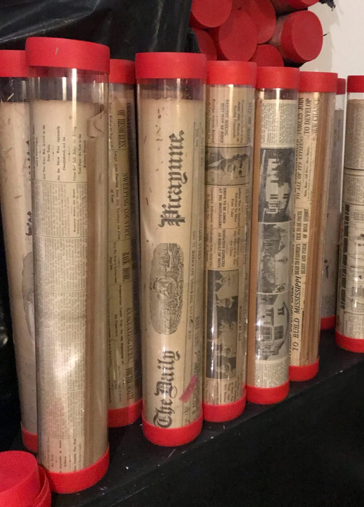 New Orleans newspapers preserved in tubes. Courtesy of Joseph Makkos, NOLA DNA Project.